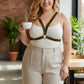 Plus-size khaki vegan-leather V-frame chest harness with O-ring by HarnessClub