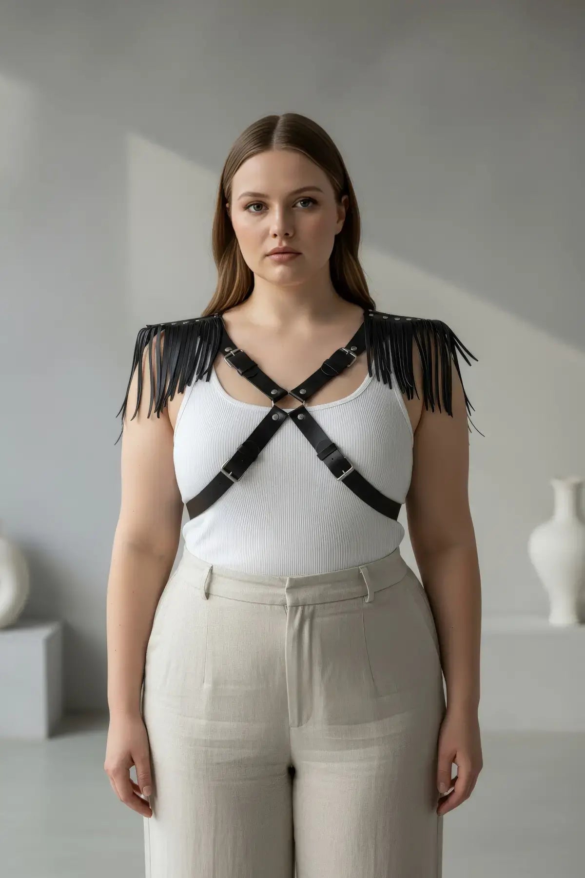 Plus Size Leather Body Harness with Shoulder Tassel Detail by HarnessClub, black leather with cross-front straps.