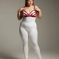 Plus Size Red Bra-Style Faux Leather Harness Set displayed over a white bodysuit with metal hardware