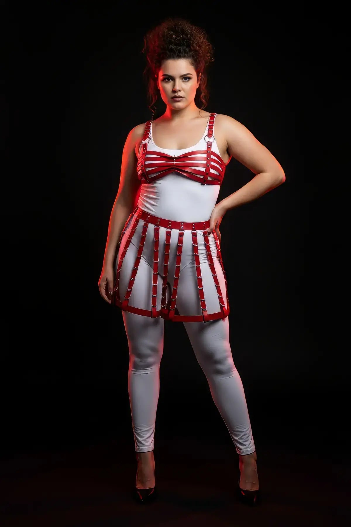 Plus-size red vegan-leather bralette and caged skirt harness set