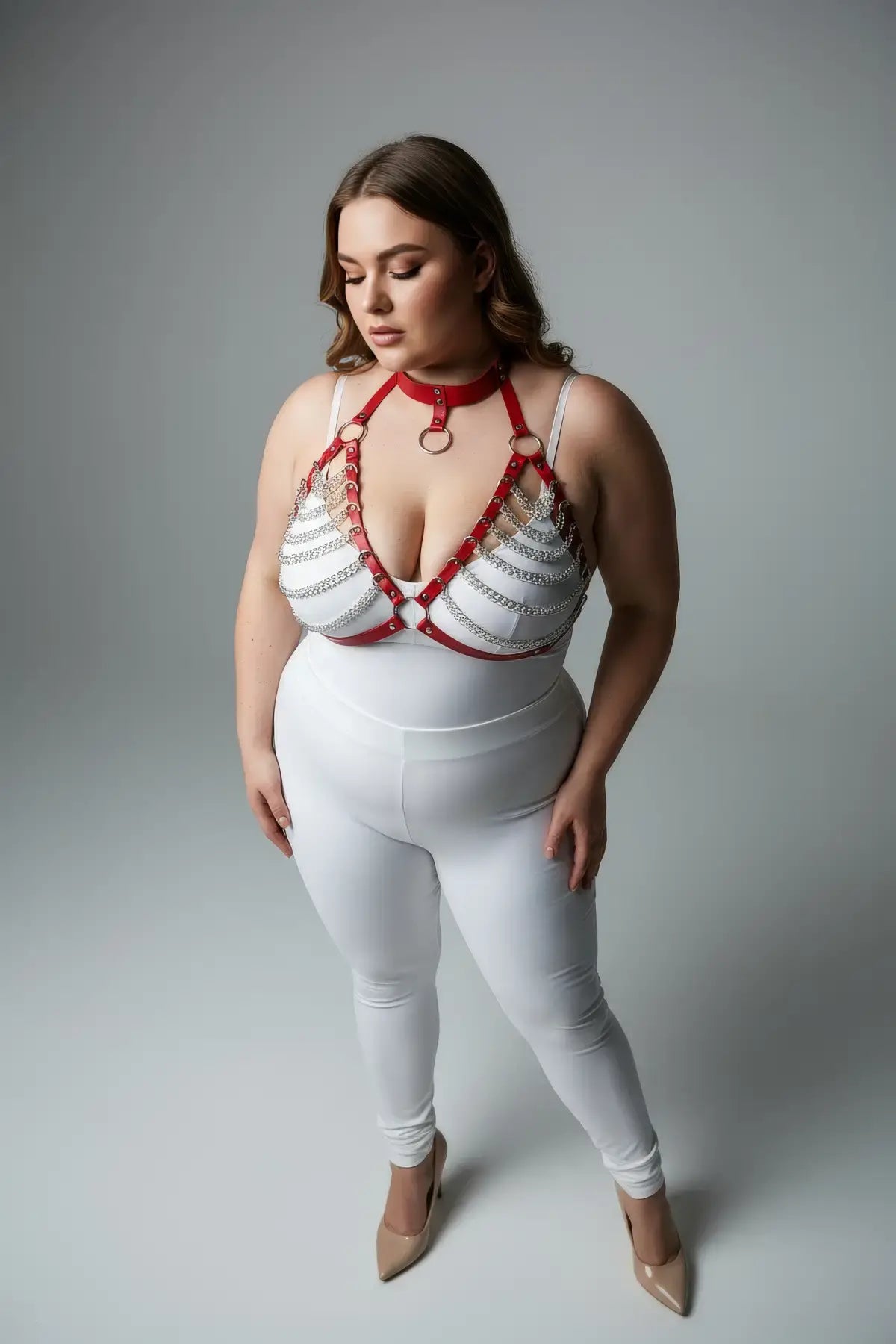 Plus-size red faux leather harness with choker collar and chain-link detailing.