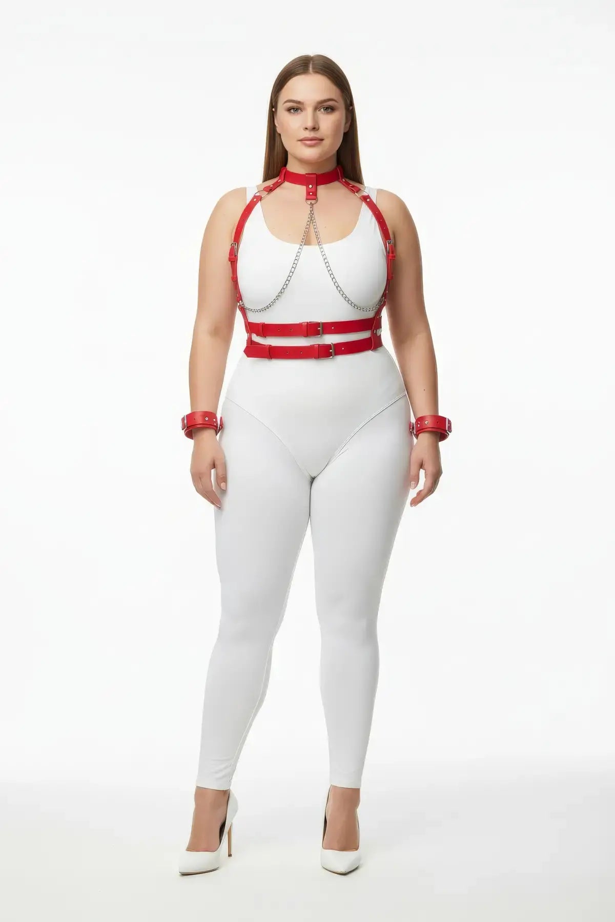 Plus Size Red Chain Chest Harness & Cuff Set by HarnessClub worn on a model in a white bodysuit; vegan leather with silver chains