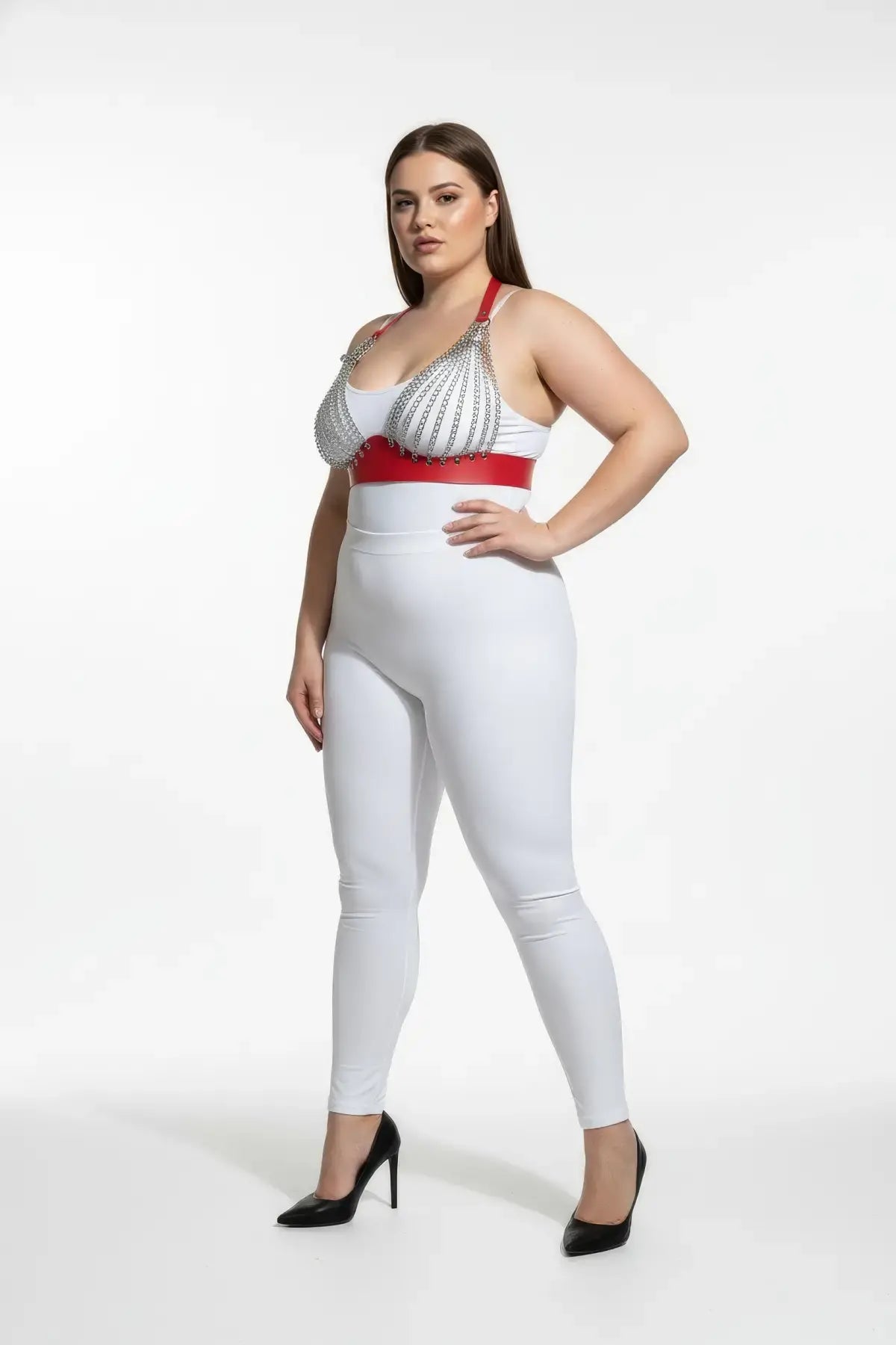 Plus-size red chain-detail faux leather harness set by HarnessClub worn over a white bodysuit
