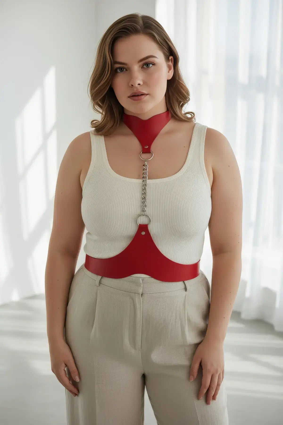 Plus Size red leather body harness with chain detail and metal rings, HarnessClub.