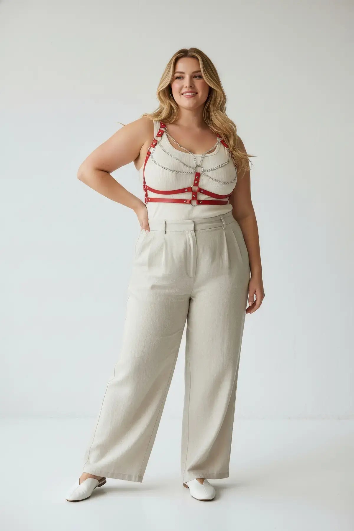 Plus-Size Red Chain-Draped Cage Chest Harness worn over a white top; vegan leather straps with silver chain accents.