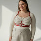HarnessClub plus-size red vegan-leather chest harness with silver chain drapes