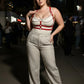 Plus-size red chain-draped cage chest harness with silver chains, vegan leather.