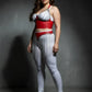 Plus-size red vegan-leather bralette and fringe skirt set with silver chains