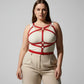 Plus-size red leather corset-detail body harness worn over a white ribbed tank top, HarnessClub