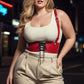 Plus size red vegan leather corset harness with lace-up front worn over a white tank top.