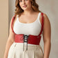 Plus-size red corset harness by HarnessClub; vegan leather with lace-up front and adjustable shoulder straps