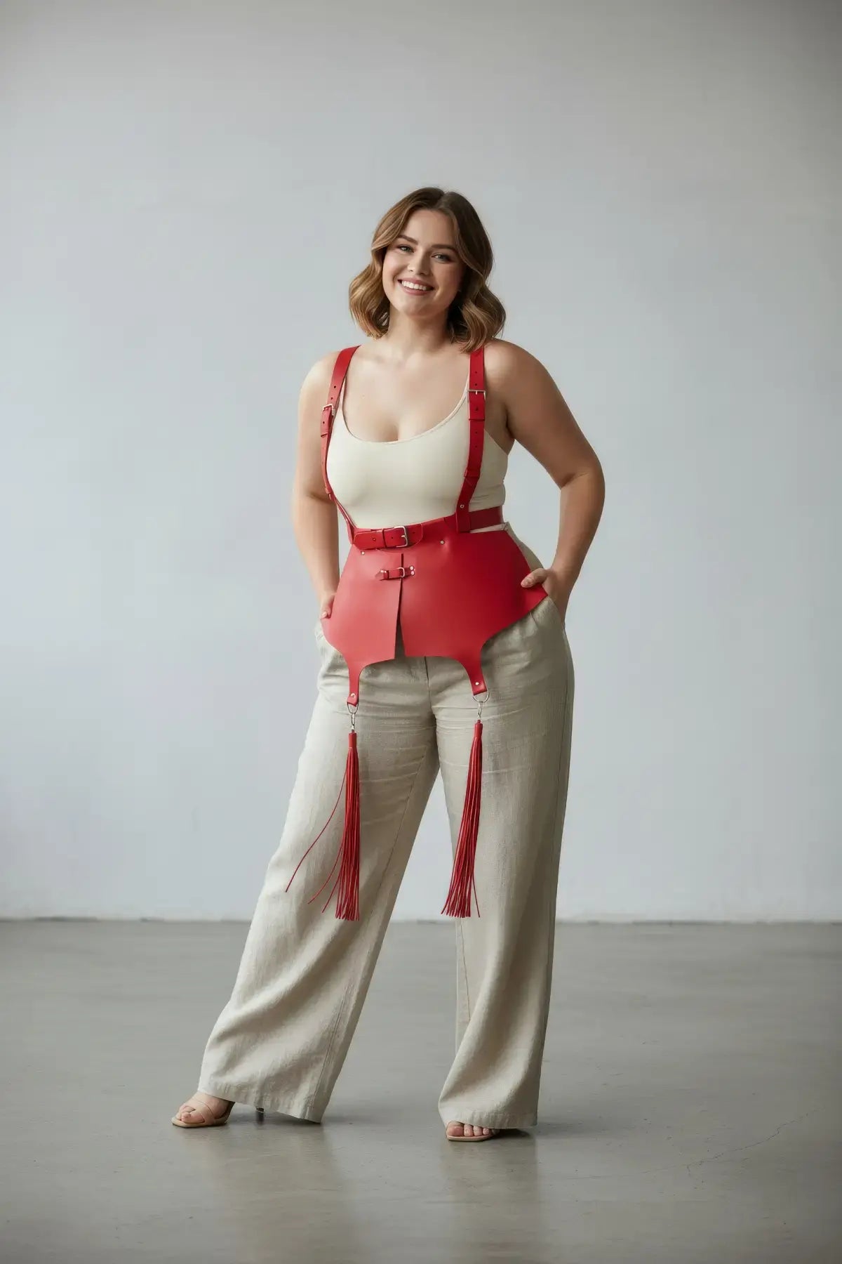 Plus-size red vegan-leather corset suspender harness with tassels by HarnessClub