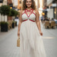 Plus Size Red Crossing Cage Harness worn over white dress; vegan leather by HarnessClub.
