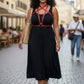 Plus Size Red Crossing-Strap Chest Harness in vegan leather worn over a black dress