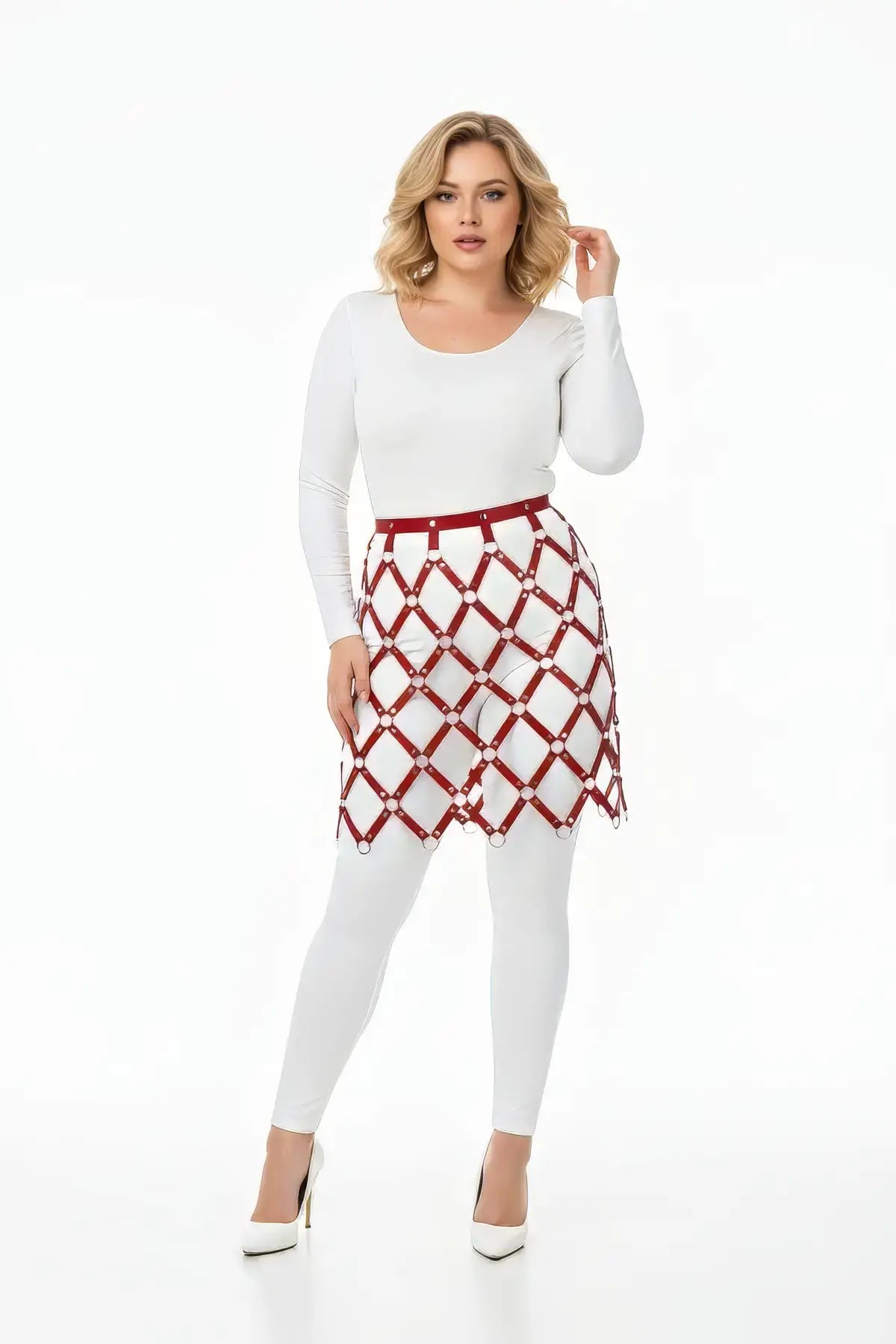 Plus-size red vegan-leather diamond lattice harness skirt by HarnessClub worn over white outfit