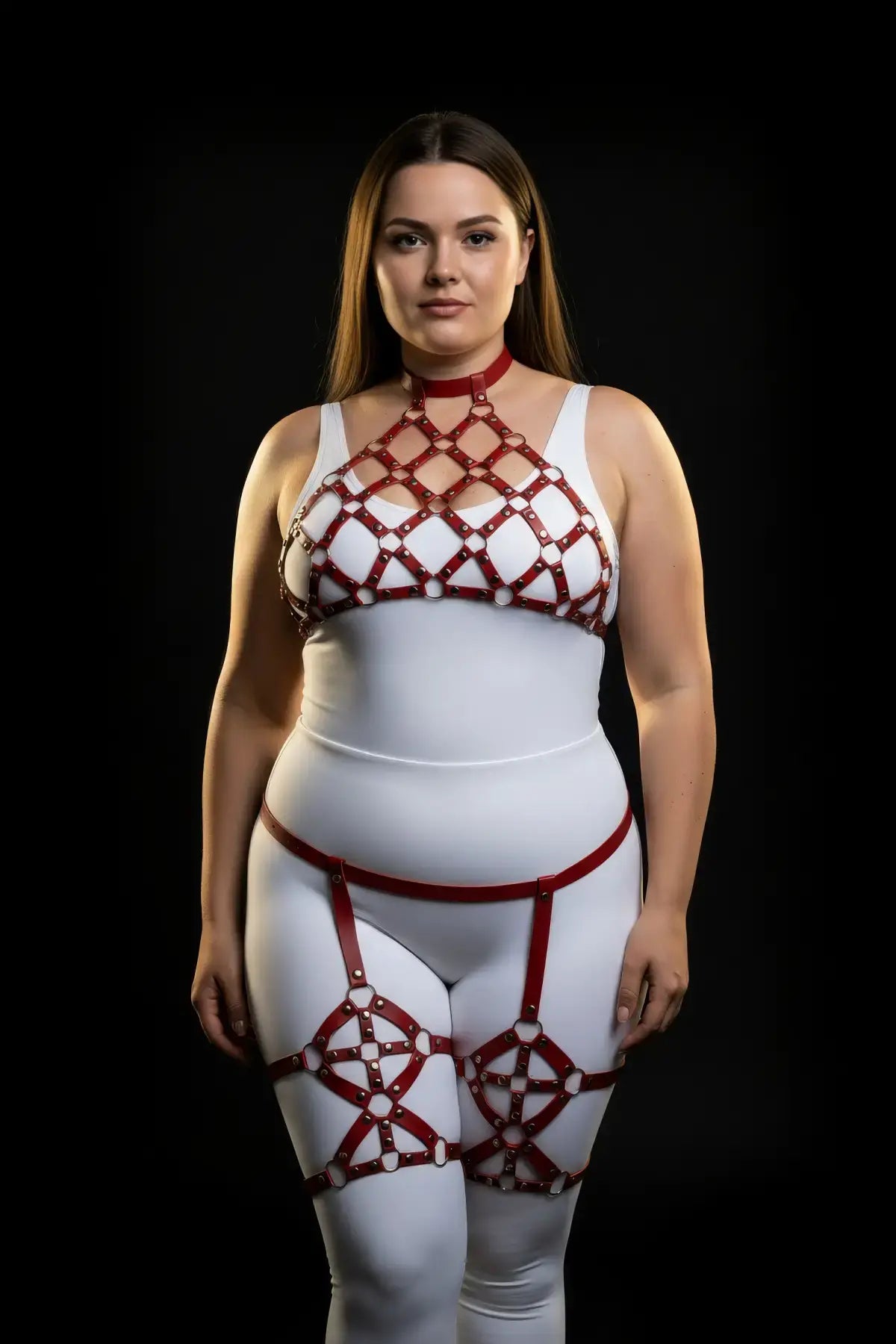 Plus Size Red Diamond Lattice Cage Harness Set made of vegan leather, worn over a white bodysuit.