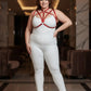 Plus size red elastic O-ring harness set with straps worn over a white bodysuit