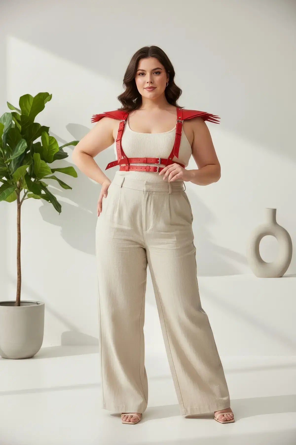 Plus-size red epaulette fringe shoulder harness in vegan leather.