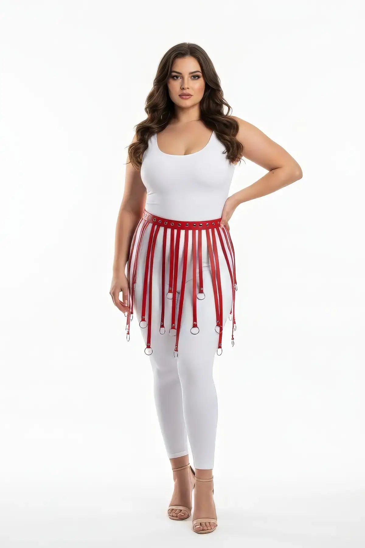 Plus-size harness skirt with red eyelet belt straps and fringe in vegan leather by HarnessClub