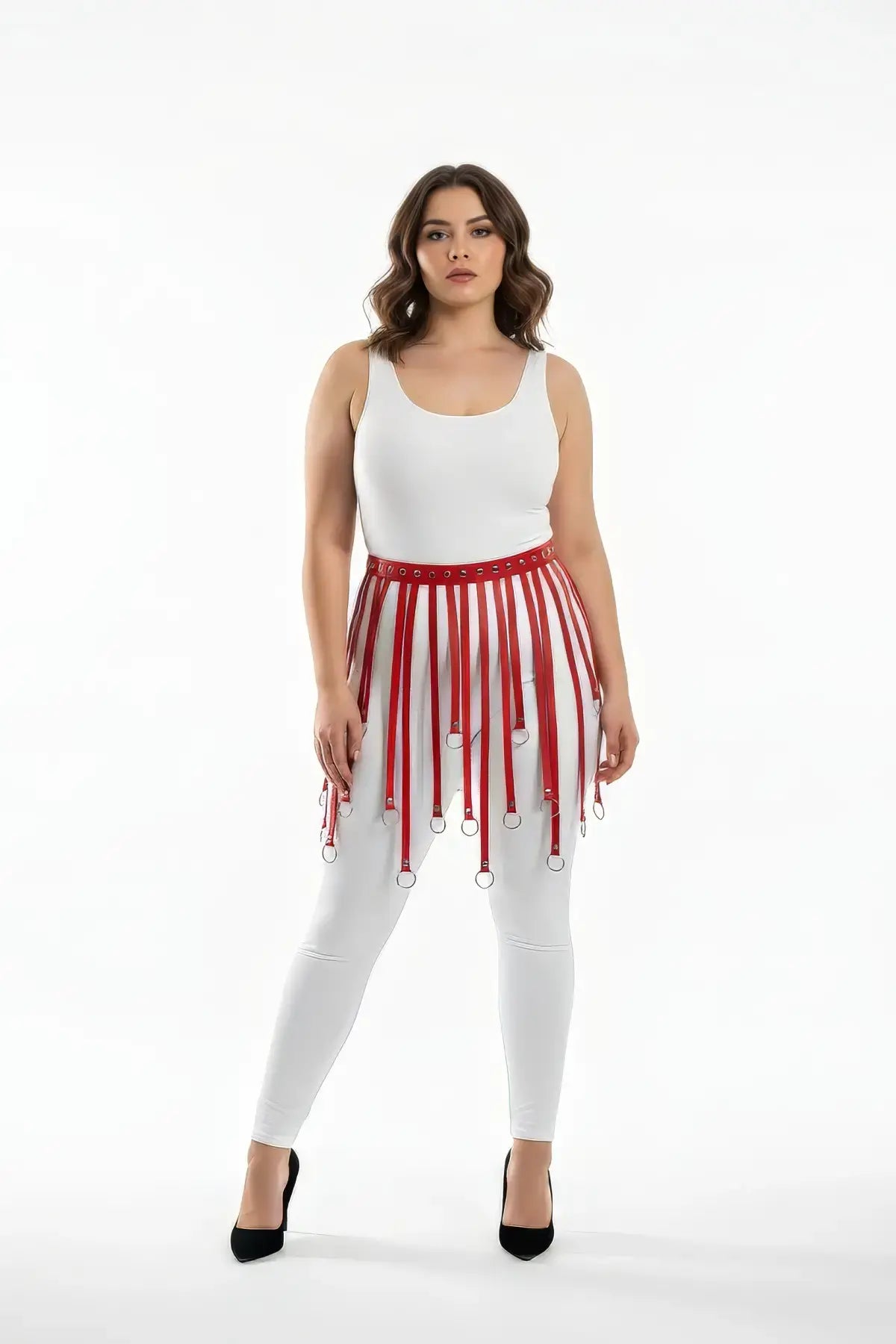 Plus-size red eyelet fringe harness skirt by HarnessClub; vegan leather waist belt with hanging straps.