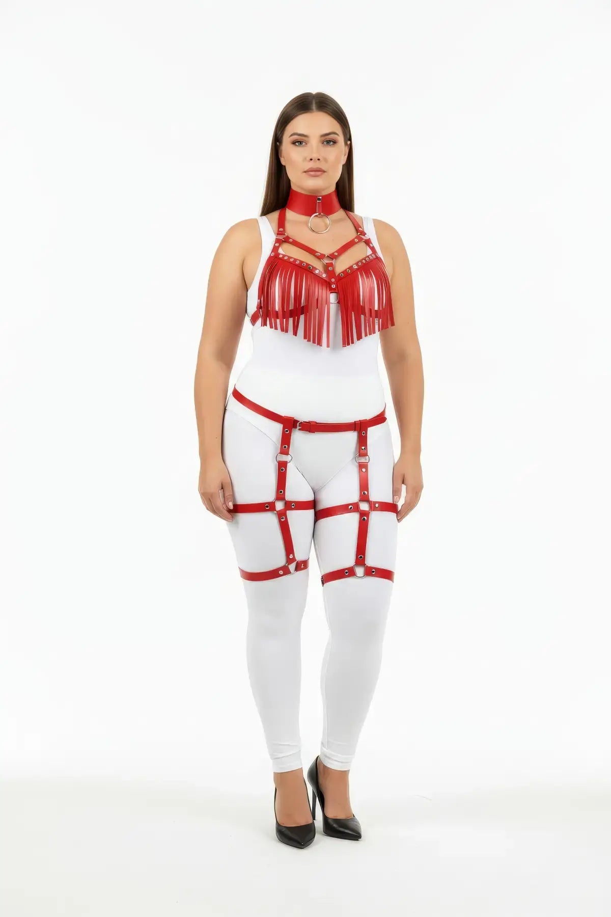 Plus-size red fringe tassel harness and garter set in vegan leather, worn by model.