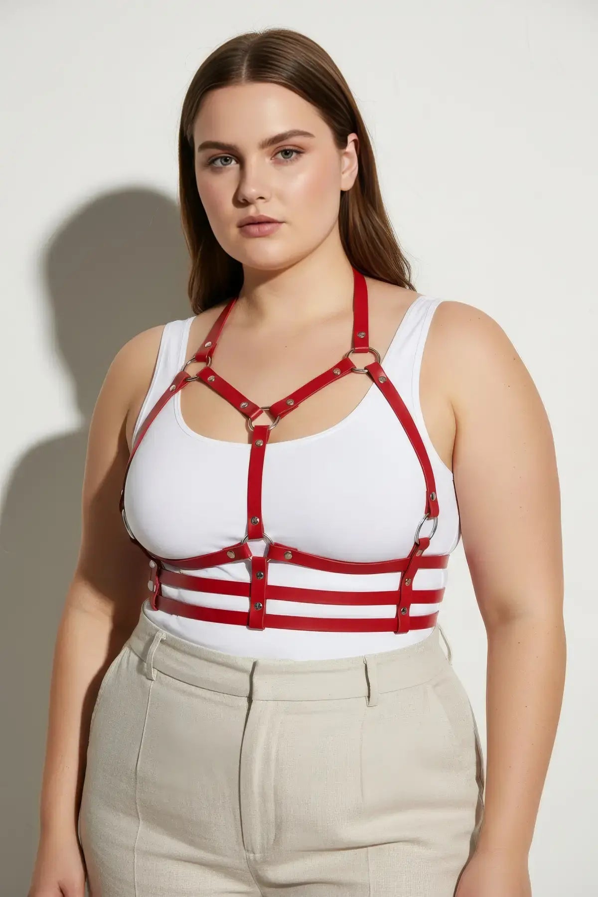 Plus-size red halter chest harness with ribcage cage bands in vegan leather