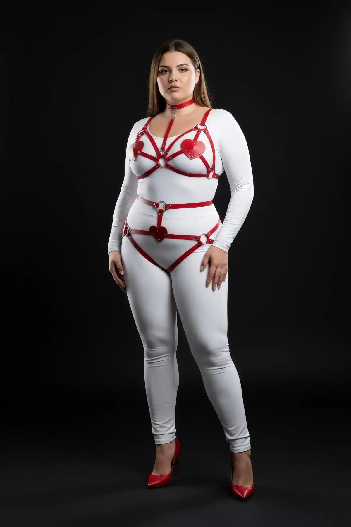 Plus-size red heart-detail three-piece full-body harness set on white bodysuit, vegan leather, by HarnessClub.