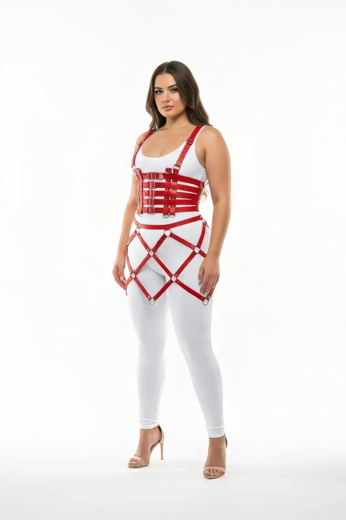 Plus-size red vegan-leather corset and cage-skirt harness by HarnessClub on a model wearing a white top