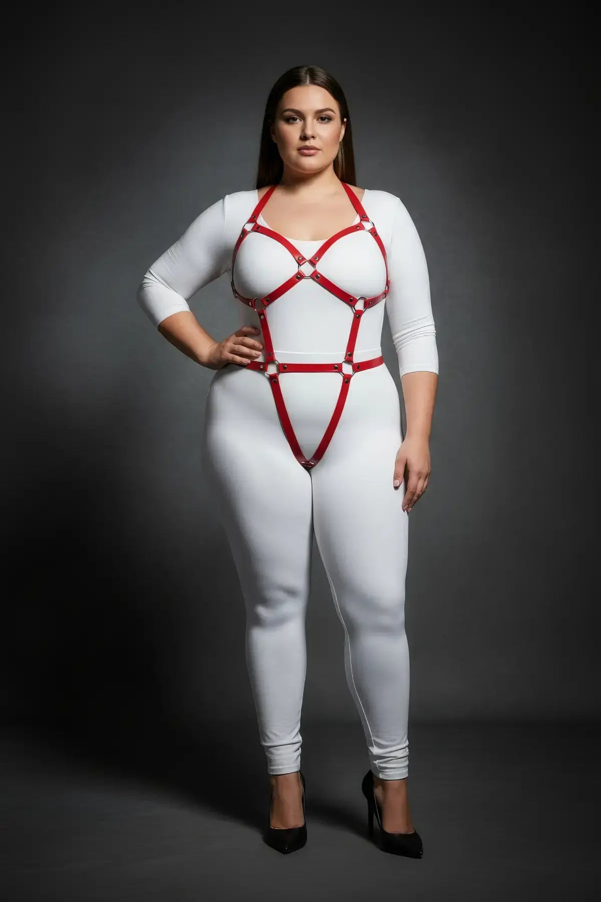 Plus Size Red Multi-Strap Body Harness by HarnessClub, vegan leather red straps over white bodysuit.