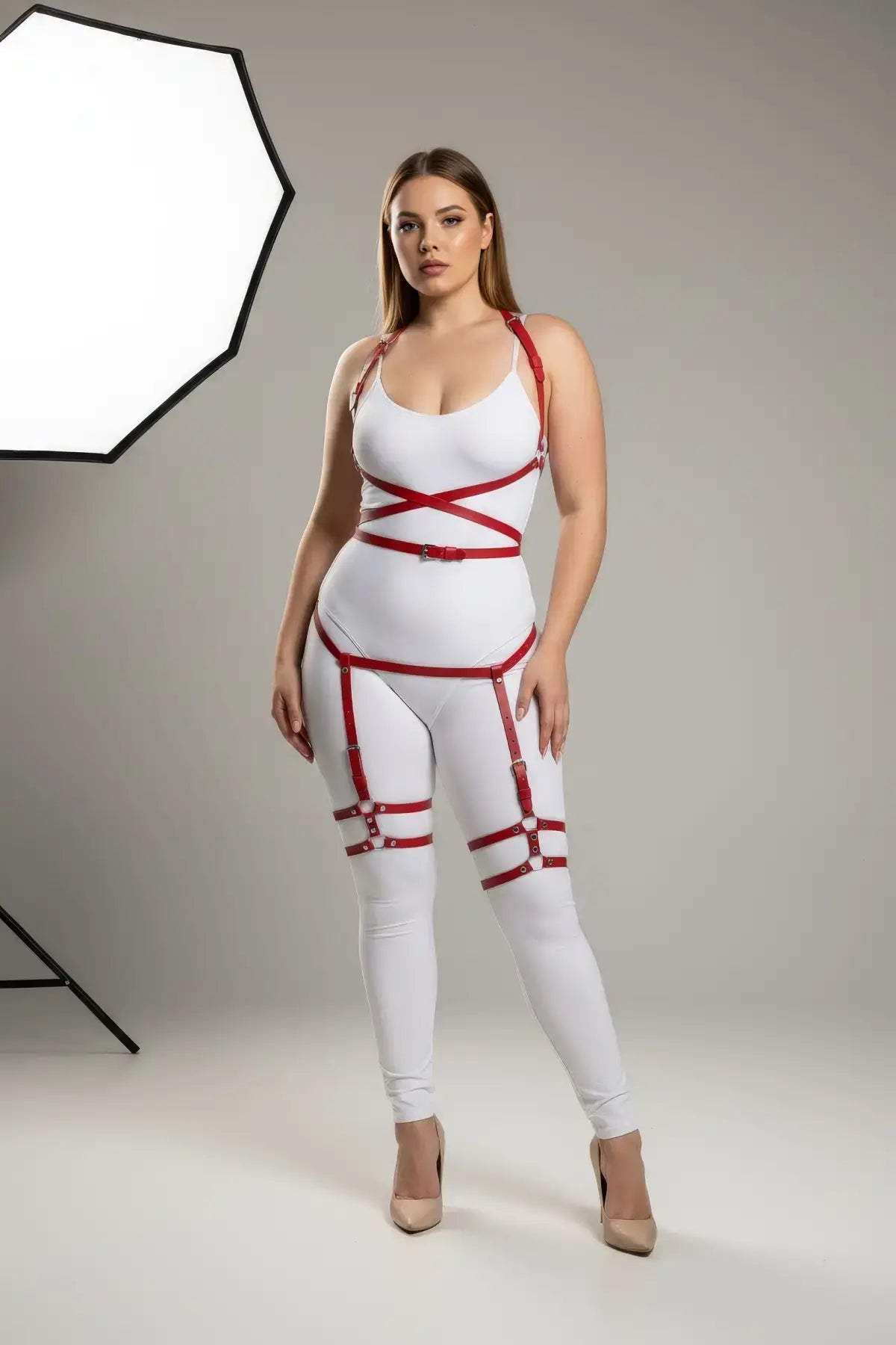 Plus Size Red Multi-Strap Faux Leather Garter Harness by HarnessClub, white bodysuit with red straps.