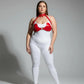 Plus-size red faux-leather bra harness with O-ring and neck collar on model