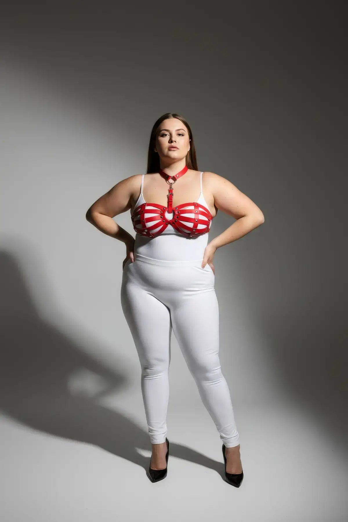 Plus Size Red O-Ring Faux Leather Body Harness Set worn over white bodysuit.