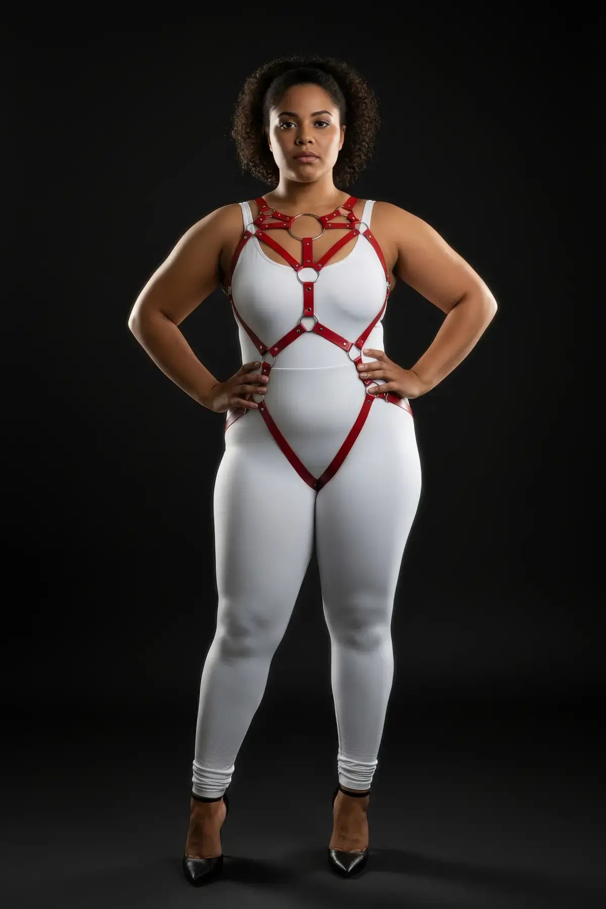 Plus Size Red O-Ring Full-Body Harness; red vegan leather straps worn over a white bodysuit