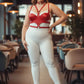 Plus-size red faux-leather chest harness with O-ring and multiple straps.