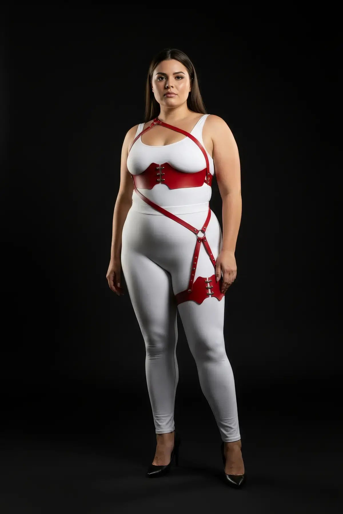 Plus-size red one-shoulder bustier harness with scalloped thigh garter in vegan leather by HarnessClub