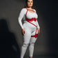 Plus-size red one-shoulder bustier harness with scalloped thigh garter in vegan leather, shown on a model.