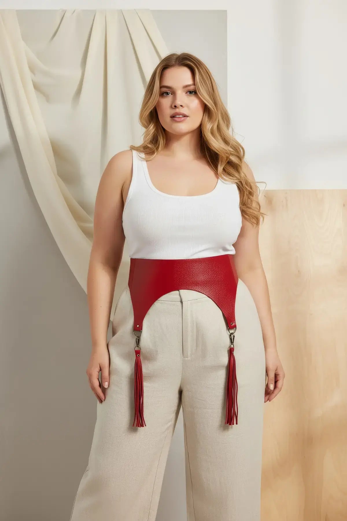 Plus-size red pebbled vegan-leather wide corset waist belt with tassels