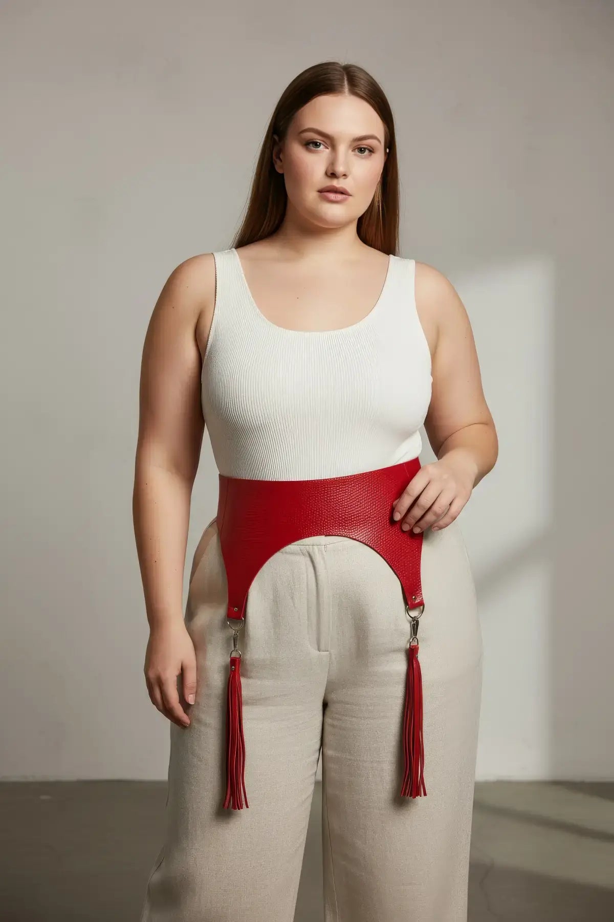 Plus-size red pebbled vegan leather wide corset waist belt with tassels