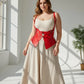 Plus-size red vegan leather shoulder strap harness vest by HarnessClub with double-buckle peplum waist cincher