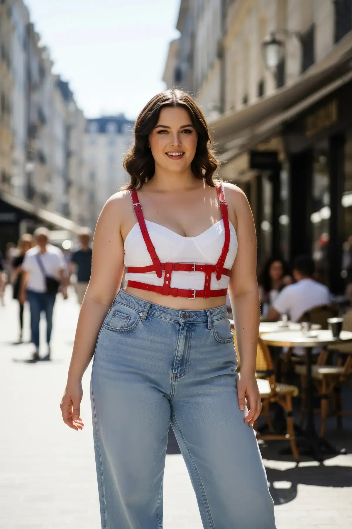 Plus Size Red Strappy Leather Body Harness by HarnessClub, worn over a white bralette.