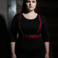 Plus Size Red Strappy Leather Garter Belt with metal buckles worn over a black dress