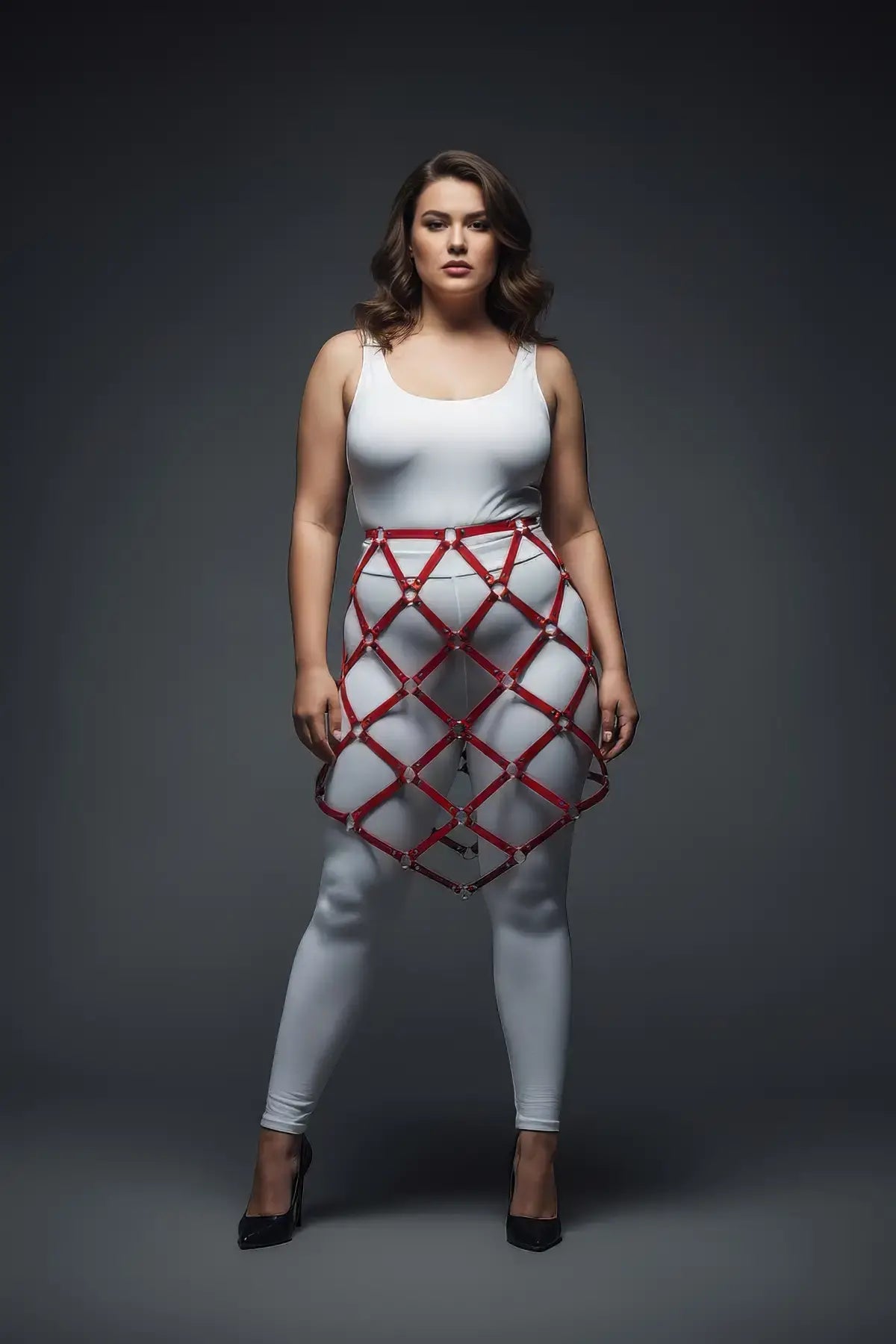 Plus-size red studded lattice cage skirt with vegan leather body harness