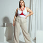 Plus Size Red Studded Leather Body Accessory worn over a white tank top