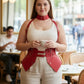 Plus-size red suspender corset harness with choker and hip flaps in vegan leather