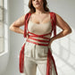 Plus-size red tassel-detail leather body harness by HarnessClub with fringe straps