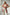 Plus-size red tassel-detail leather body harness by HarnessClub with fringe straps
