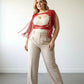 Plus Size Red Tasseled Leather Body Harness with multiple strap layers and long fringe tassels.