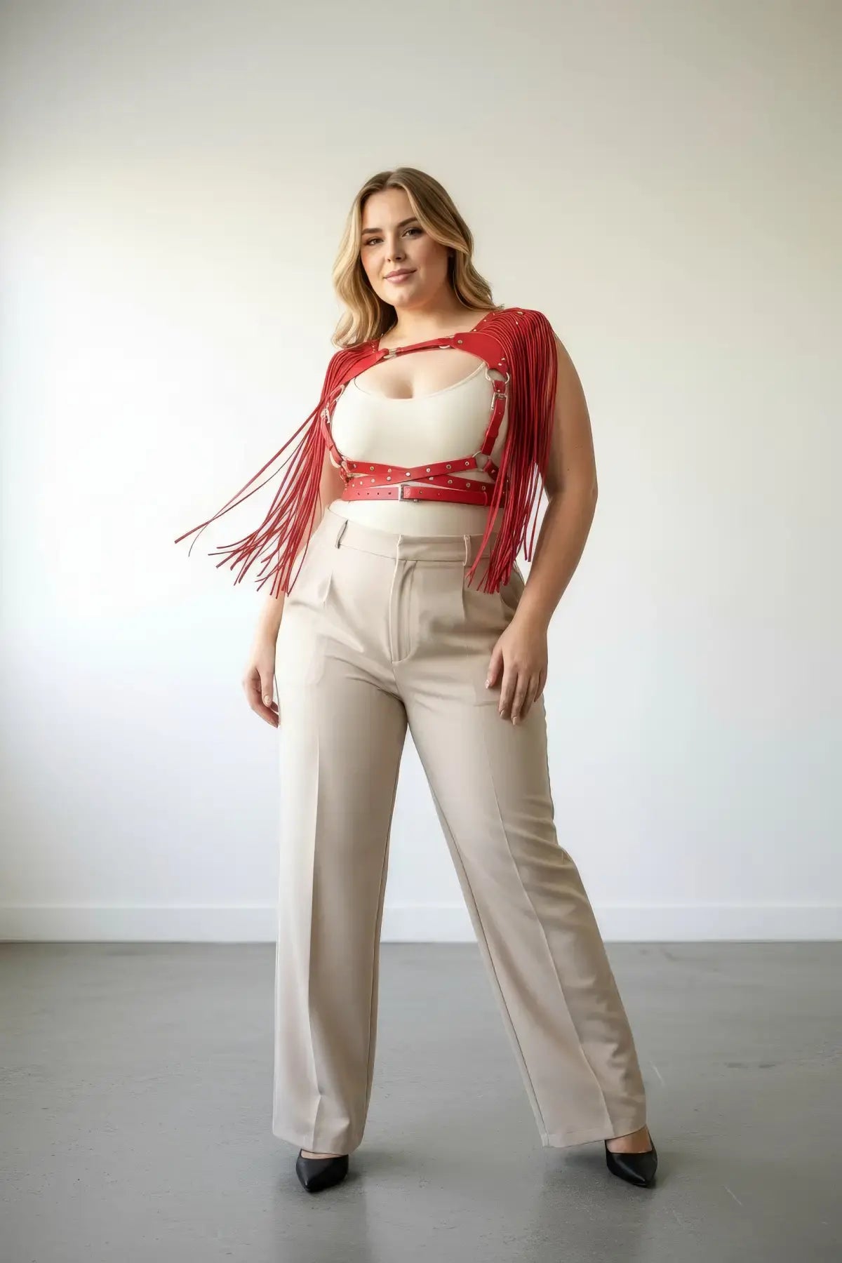 Plus Size Red Tasseled Leather Body Harness with multiple strap layers and long fringe tassels.
