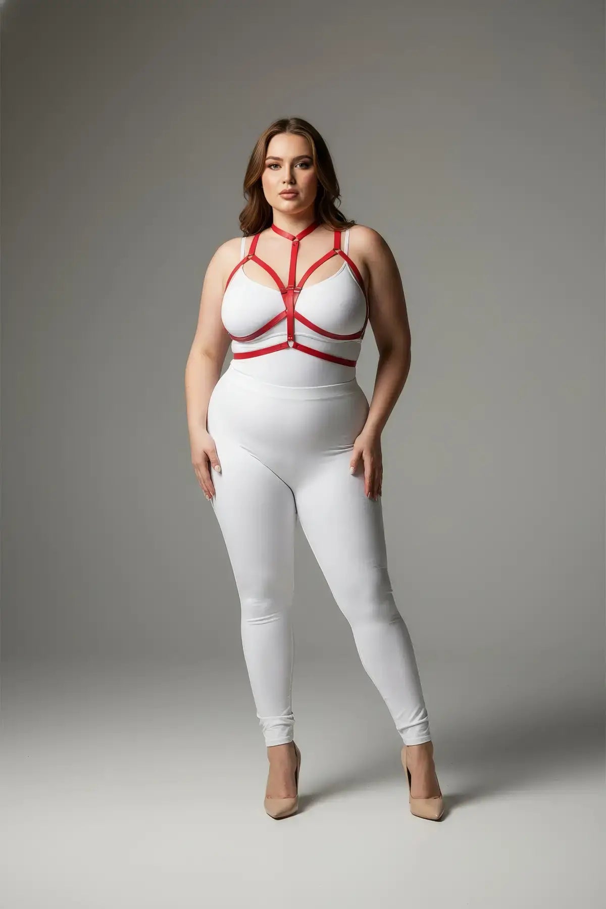 Harness, plus-size red three-zone elastic with choker and waistband, worn over white bodysuit.