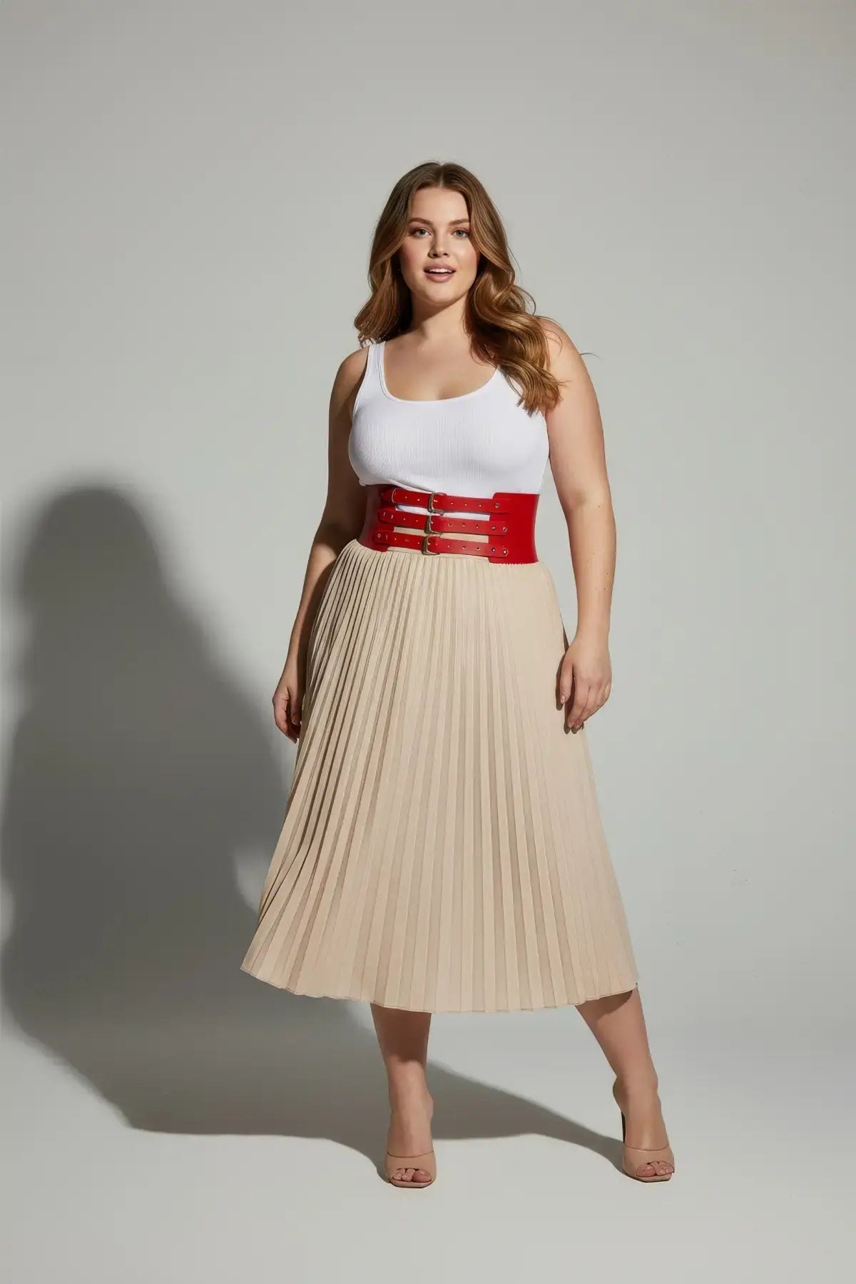 Plus-size red wide triple-buckle vegan leather corset belt by HarnessClub worn at the waist